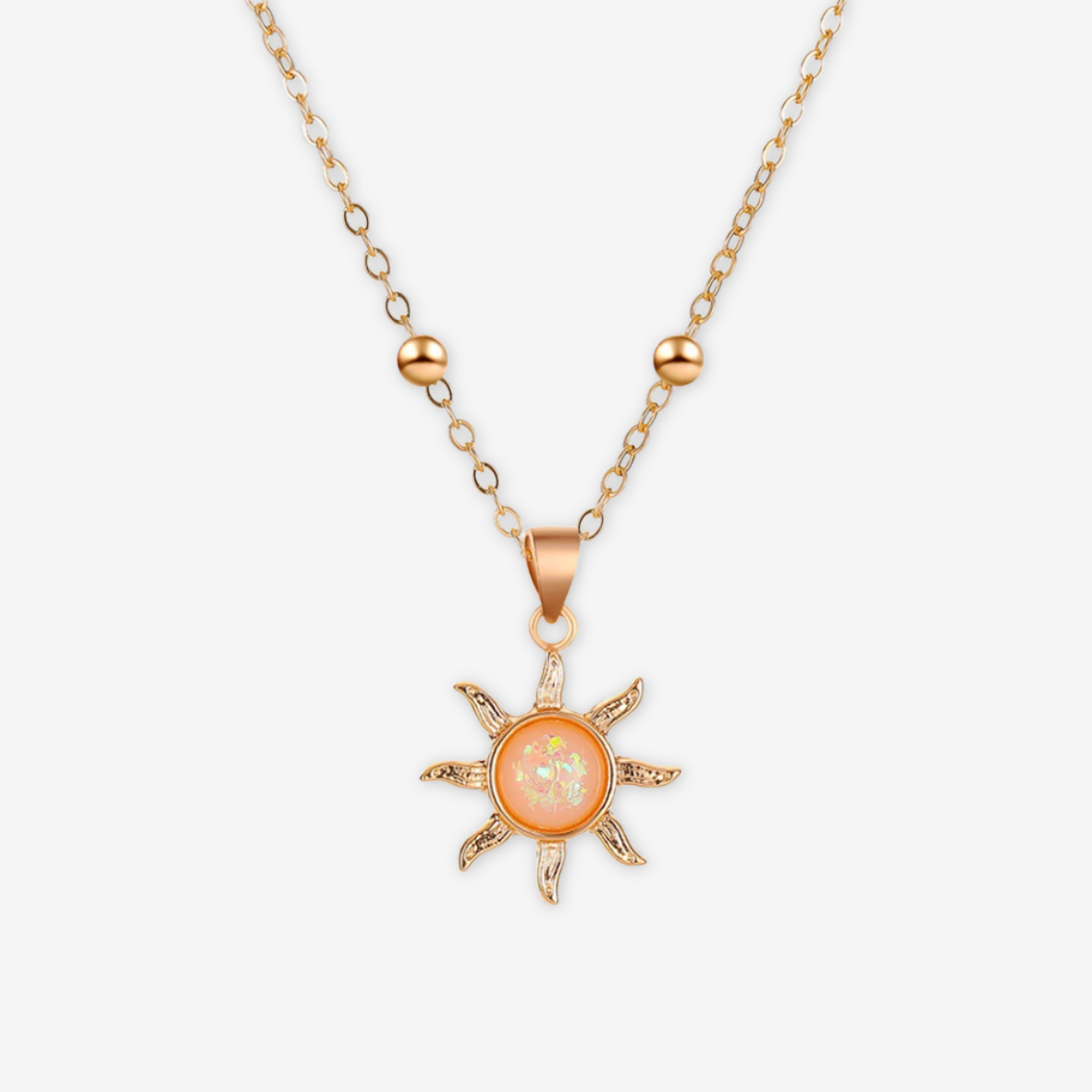 Collana con sole e madreperla centrale oro