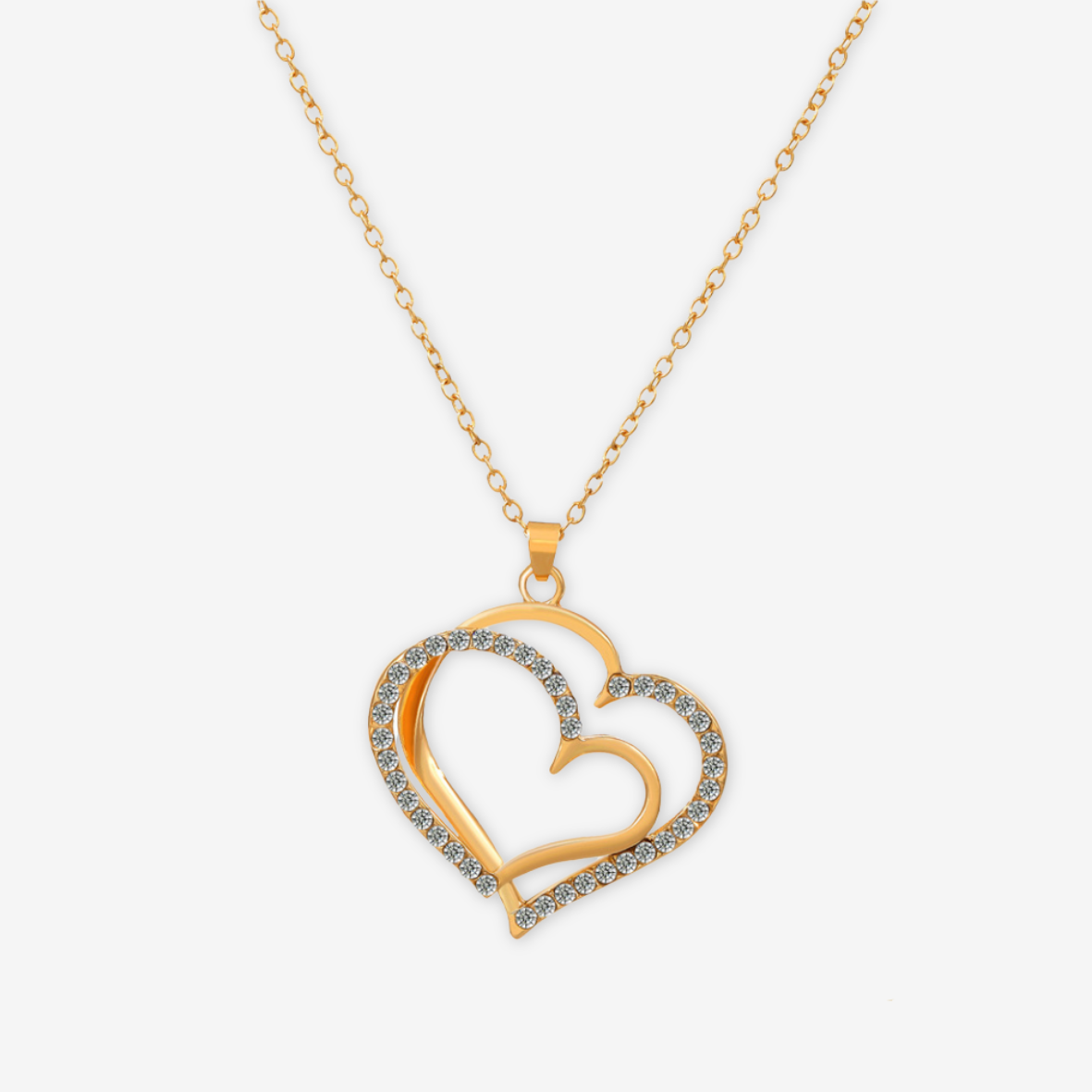 Parure collana e orecchini oro cuore con zirconi.
