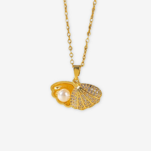 Collana in acciaio al titanio con conchiglia e perla oro.