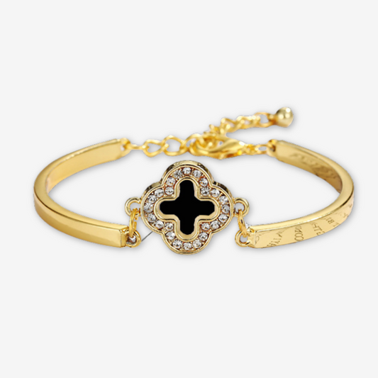 Bracciale placcato oro con quadrifoglio nero.