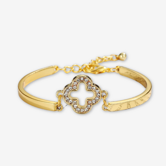 Bracciale placcato oro con quadrifoglio bianco.