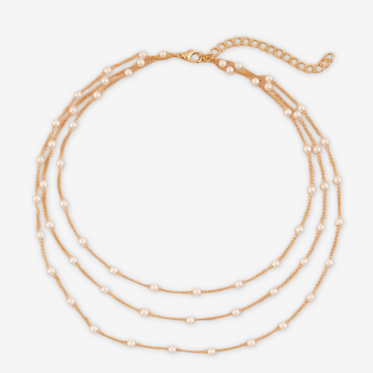 Collana dorata multistrato con catena di perle.
