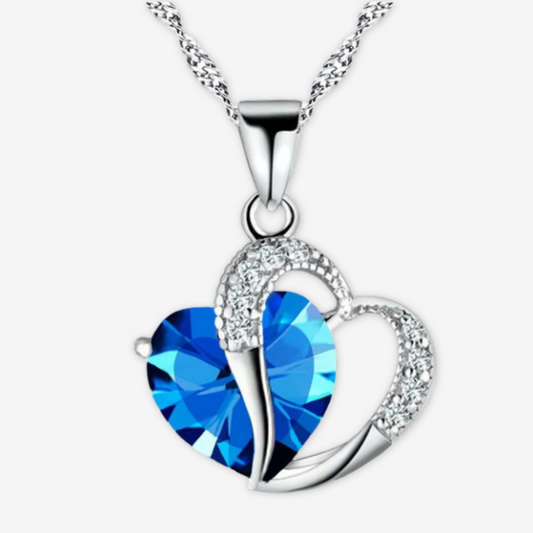 Collana a doppio cuore celeste e argento con zirconi trasparenti.