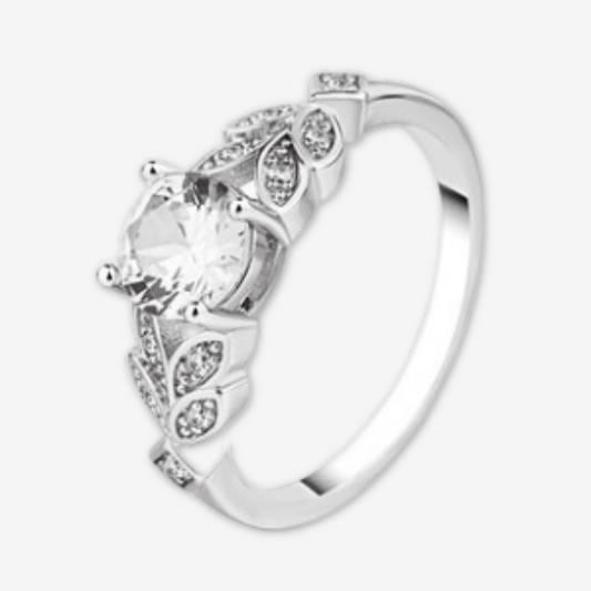 Anello argento con solitario e foglie con brillantina.