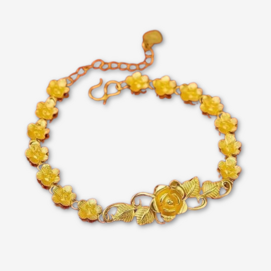 Bracciale dorato a tema floreale con grande fiore centrale
