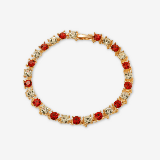 Bracciale dorato con zirconi rossi e trasparenti.