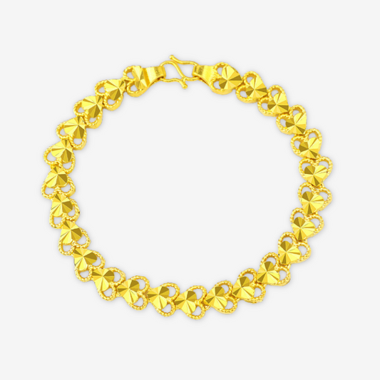 Bracciale a cuori incastonati dorato.