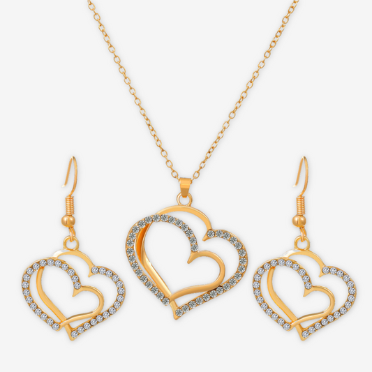 Parure collana e orecchini oro cuore con zirconi.