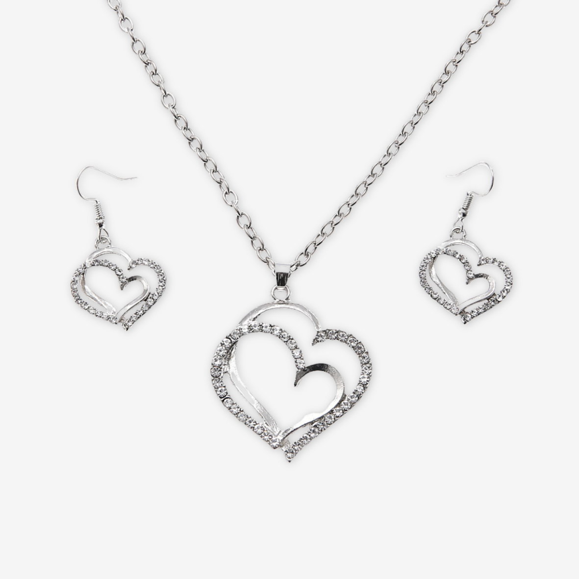 Parure collana e orecchini argento cuore con zirconi.
