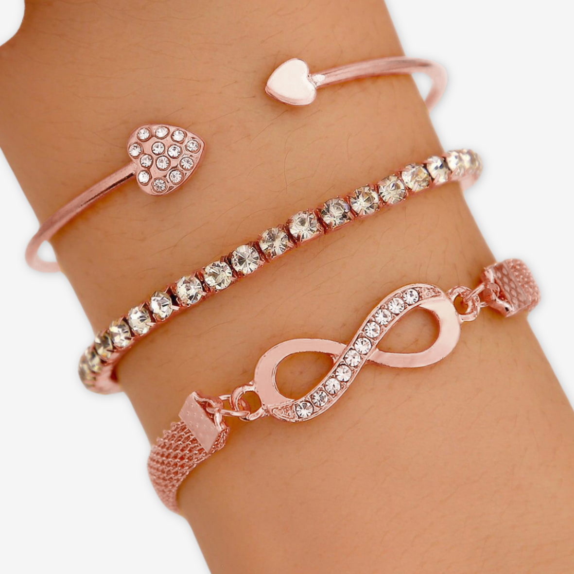 Tris bracciali come in foto oro rosa.